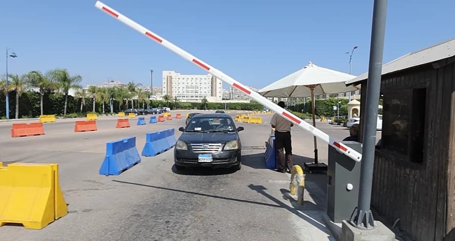 A barrier gate opening for a car